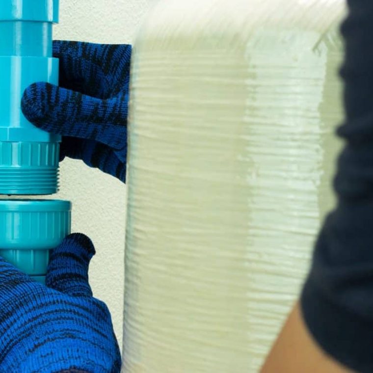 Man fixing with tube — Pure Aquatics in Waychioe, NSW