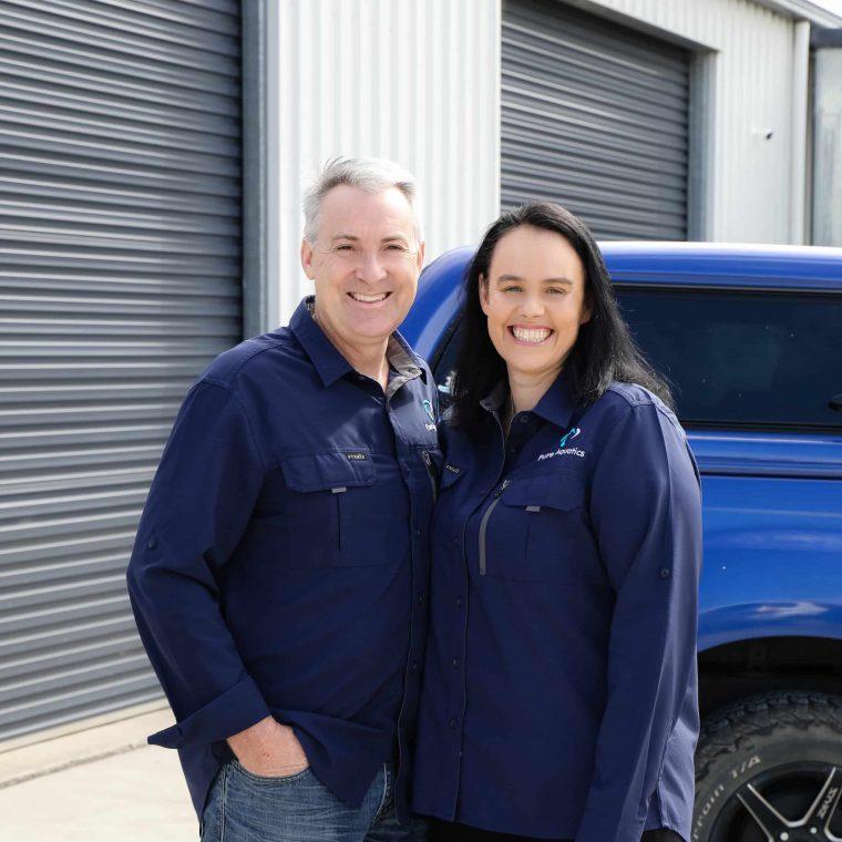 Happy Couple Wearing Long Sleeves Shirts — Pure Aquatics in Waychioe, NSW